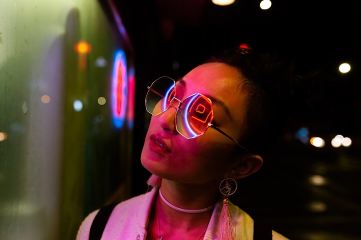 woman looking at a mirror