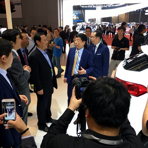 Great Wall Motors Founder and Chairman Wei Jianjun introduces WEY VVT7 to an unnamed VVIP visitor