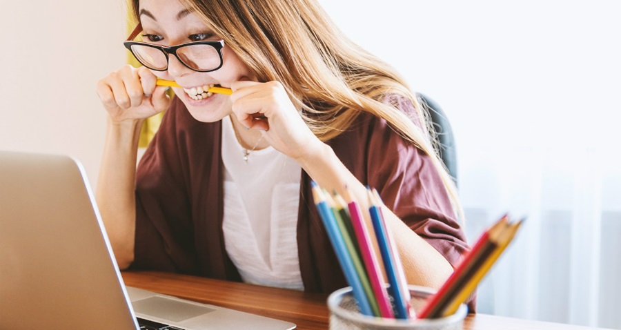 Woman frustrated at laptop