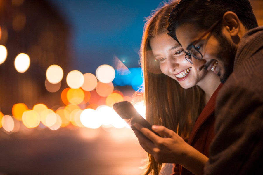 Couple look at phone