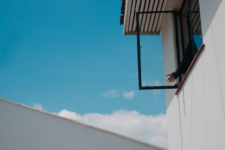 Man pointing out of a window in Nairobi