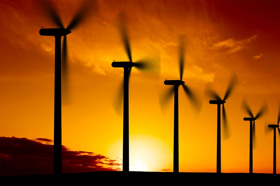Wind turbines with sunset