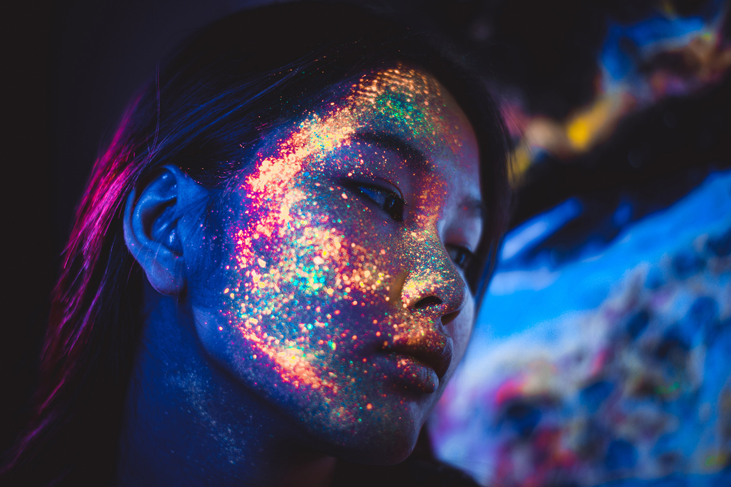 Woman with coloured face paint