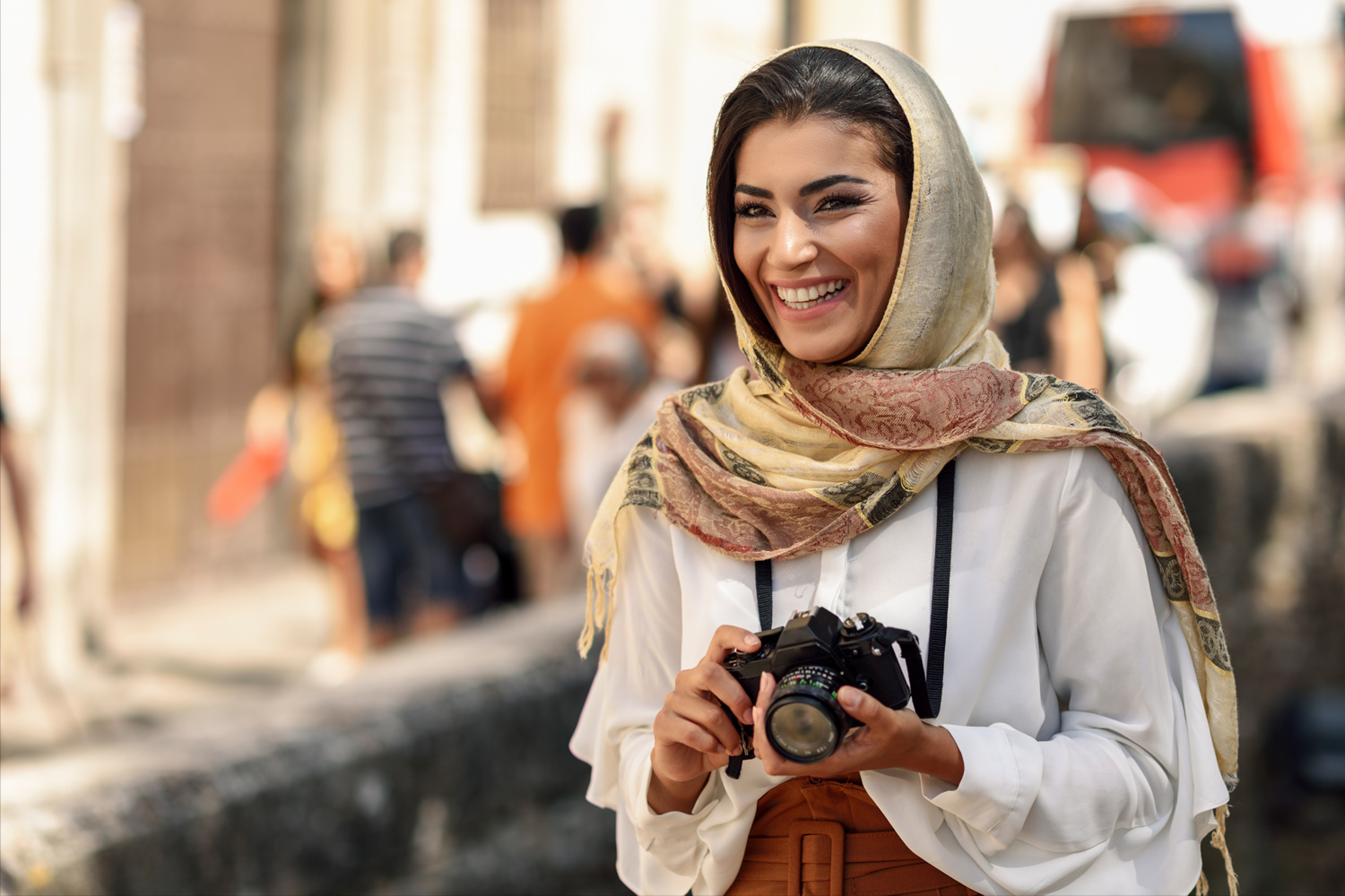 Photo of woman with a camera