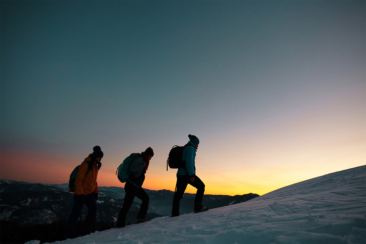 Group climbing a mountain