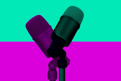 Two microphones, one green and the other purple overlapping each other.