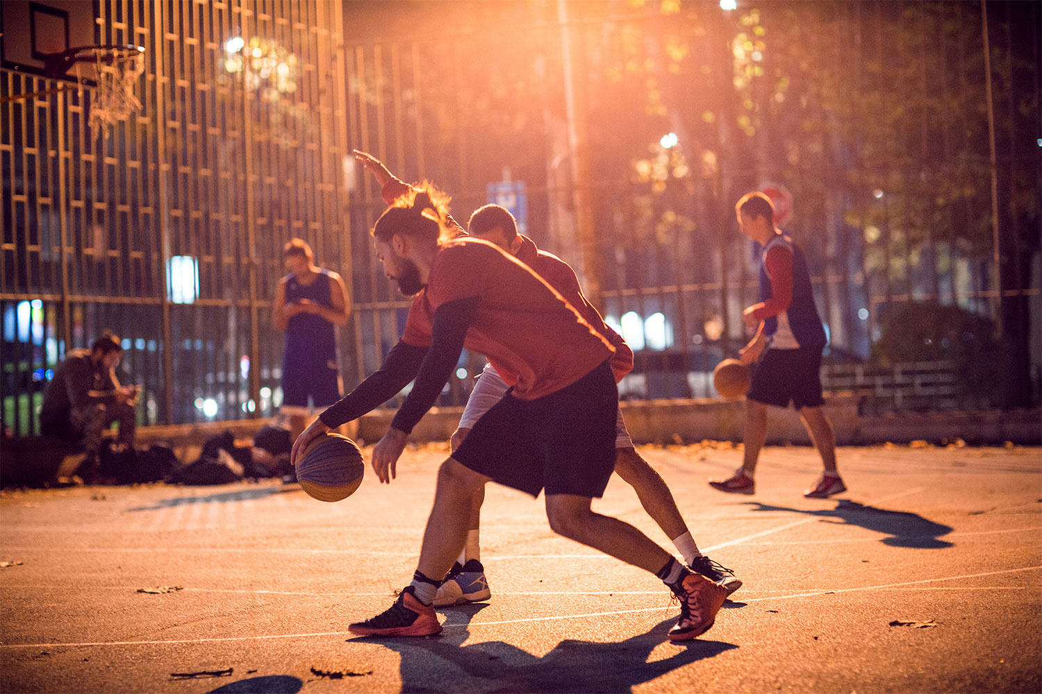 Group playing basketball