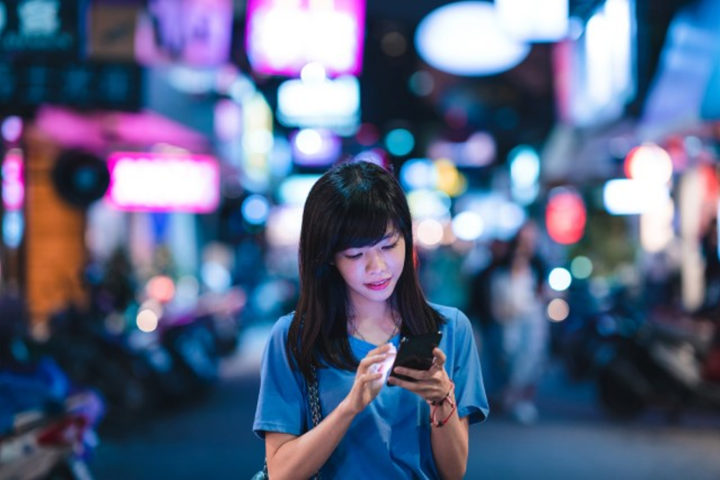 Woman scrolling on mobile