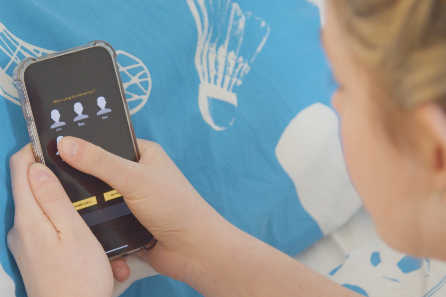 A girl using a mobile phone and identifying the user using the correct data capture software