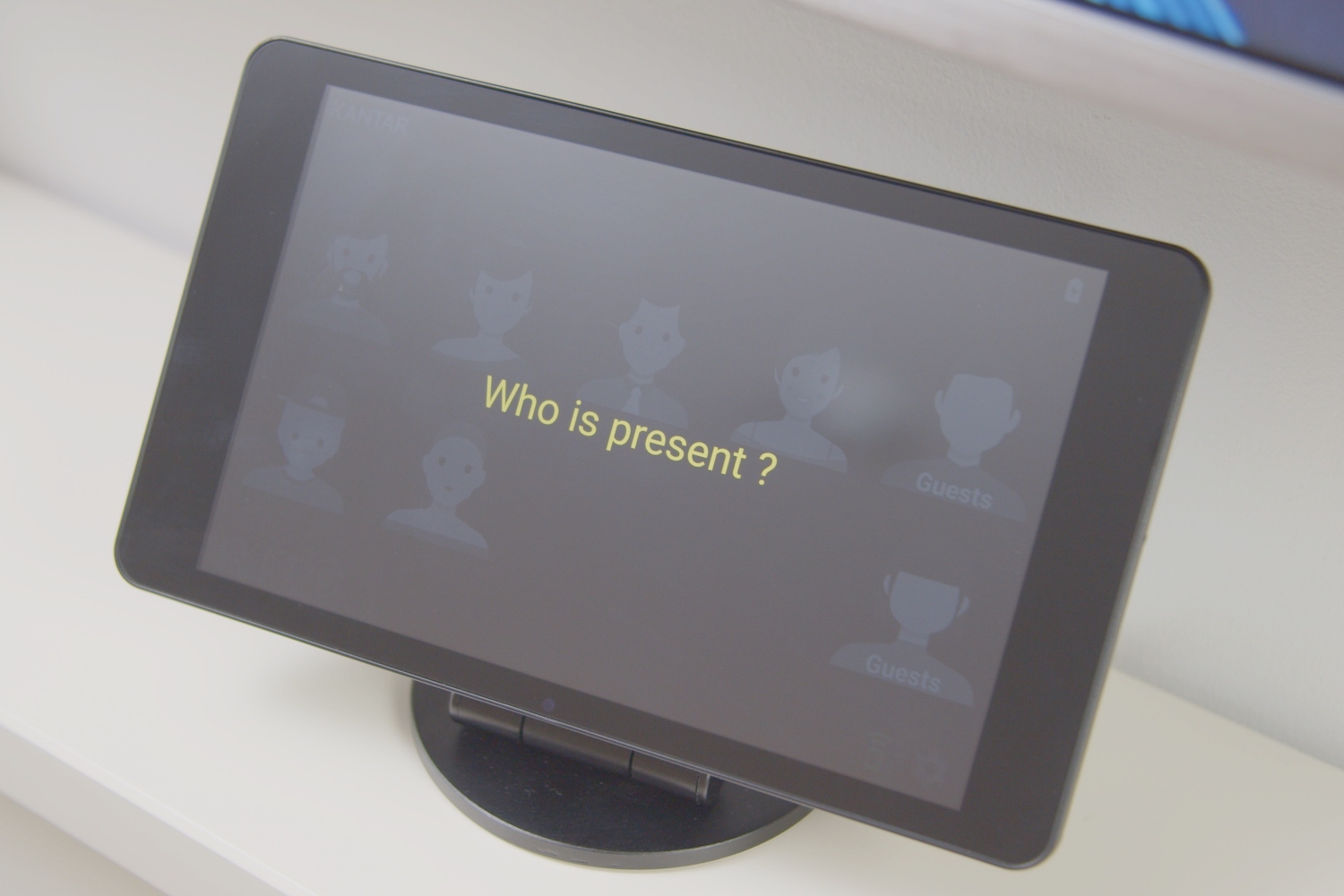 A tablet displaying a programme asking someone to select the number of viewers
