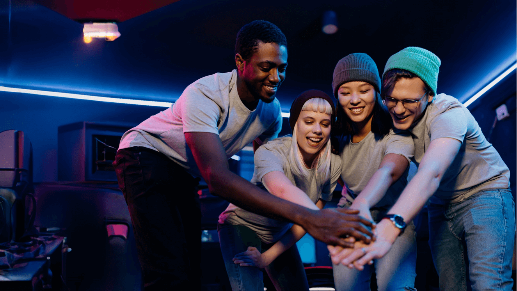 Group of people joining hands
