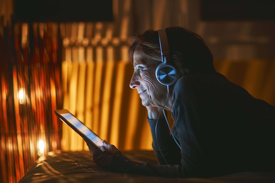 Woman watching video on a tablet
