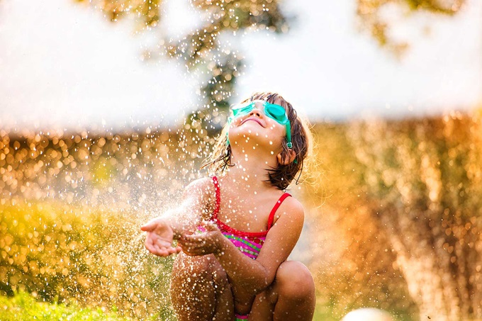 Girl playing in water