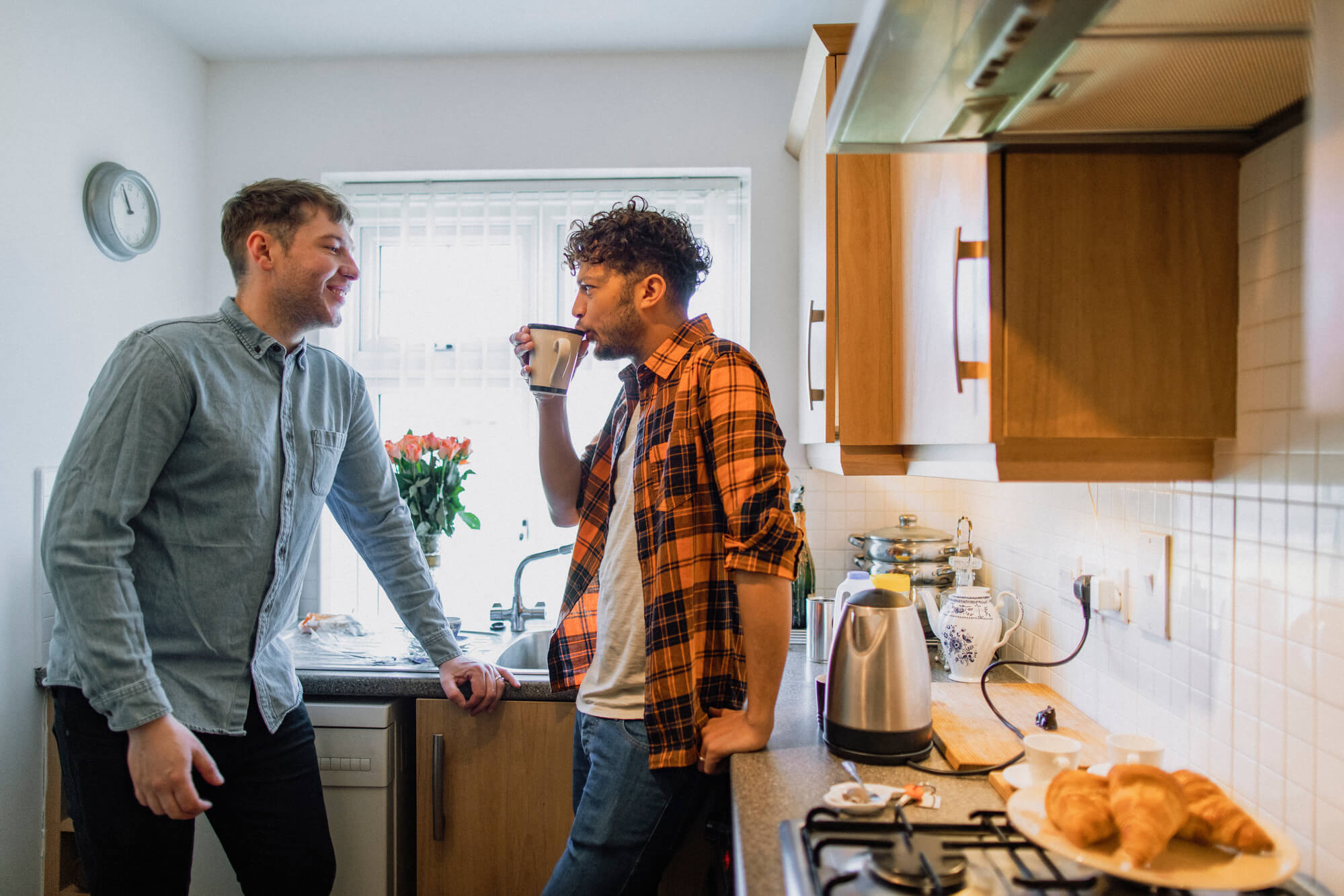 Couple in the kitchen having a cup of tea - Header image for Home Shapers article by Kantar