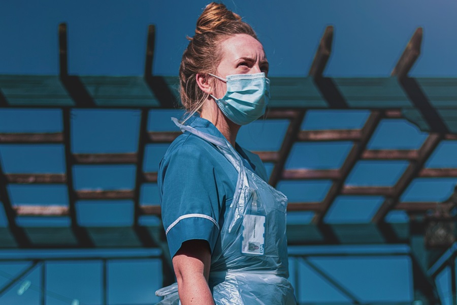 woman nurse UK covid