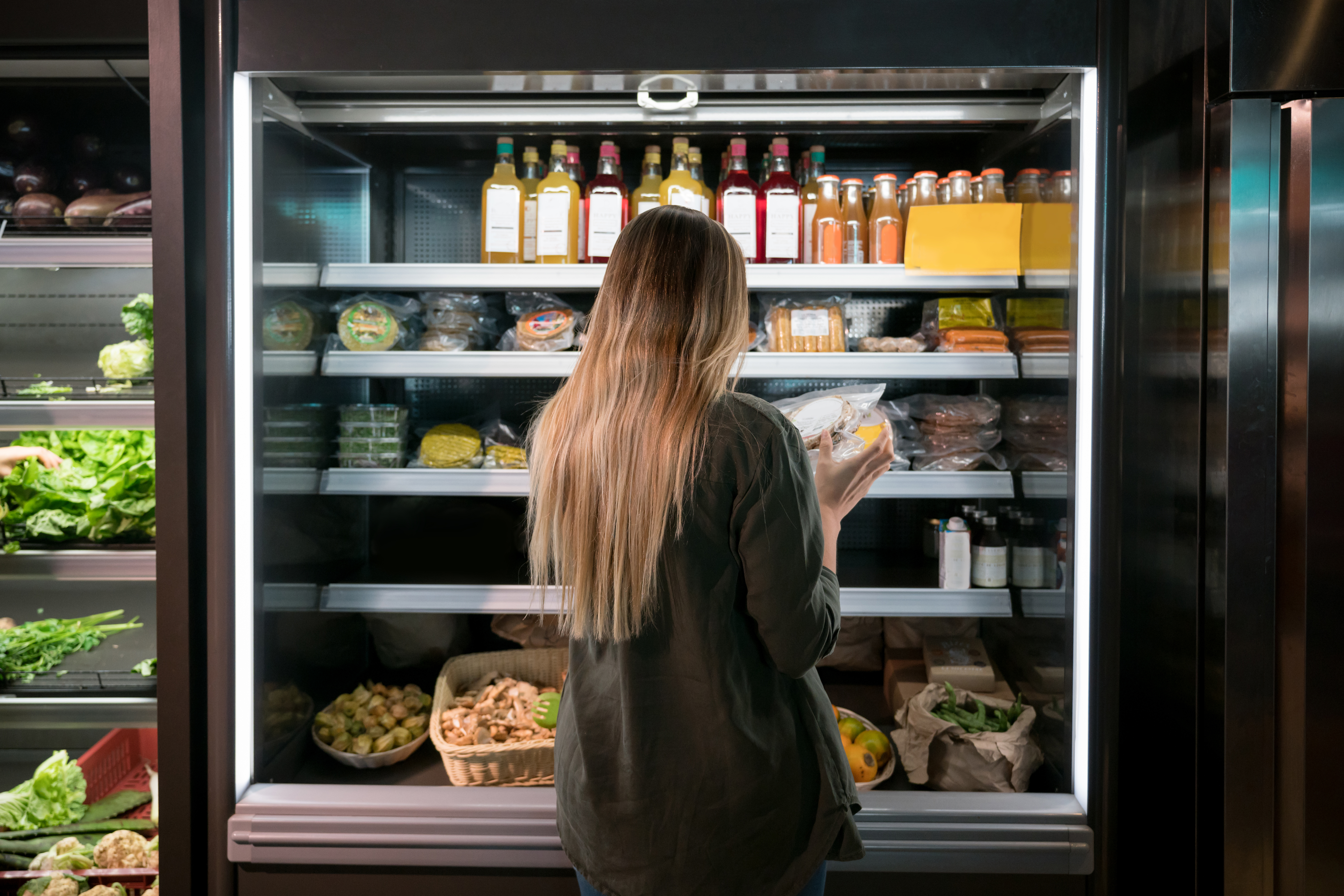 Woman in supermarket browsing